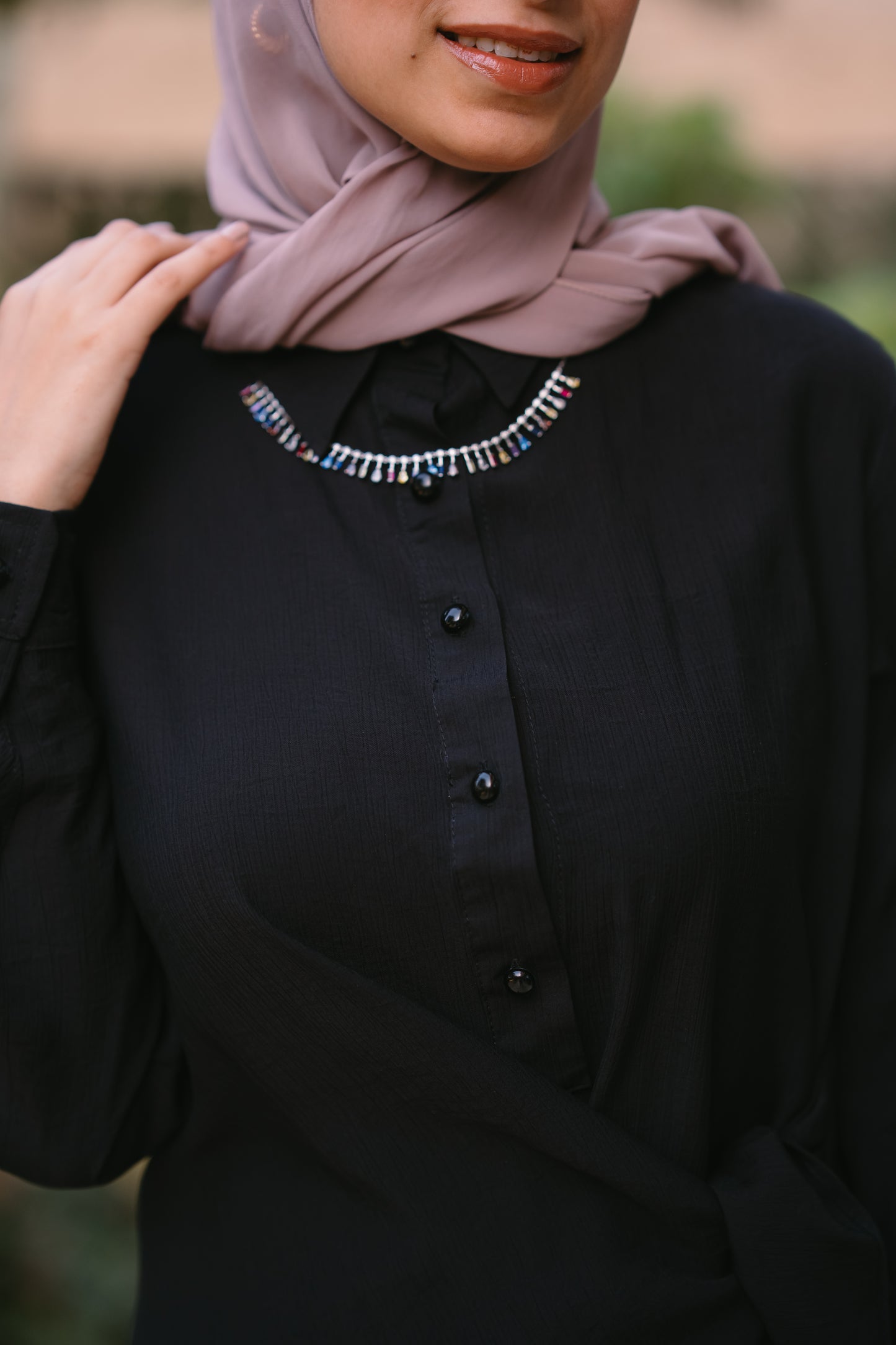 Nasaya left drape baby cotton black blouse