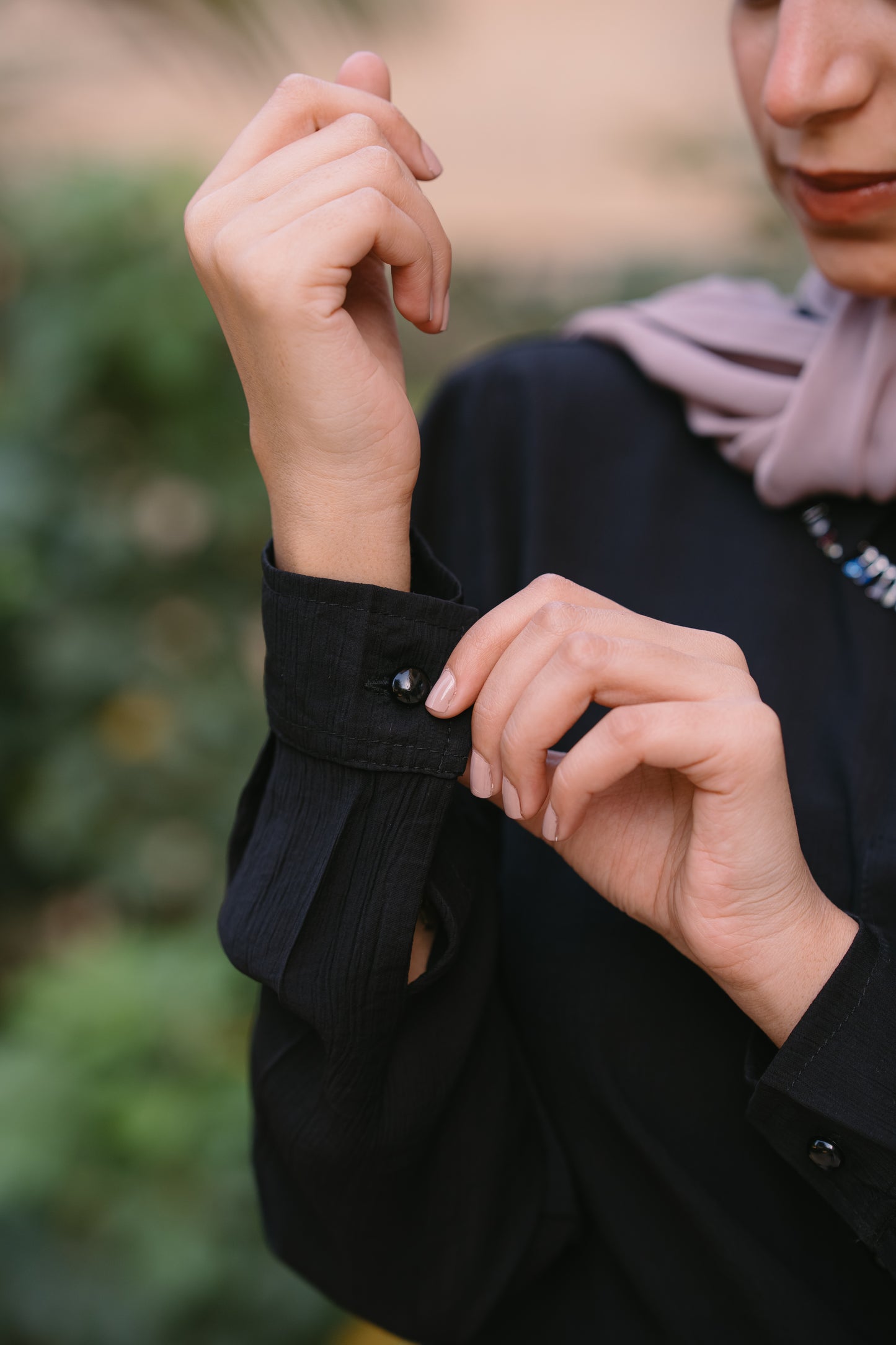 Nasaya left drape baby cotton black blouse